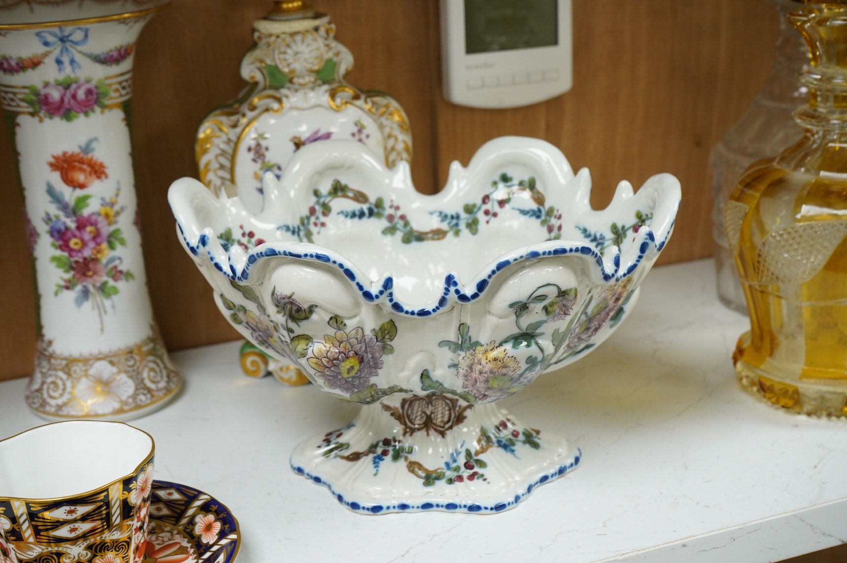 A pair of Dresden vases, a Paris porcelain bottle and stopper, a faience bowl and two Royal Crown Derby cups and saucers, tallest 26cm